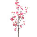 Een Kunstbloem Kersenbloesem: een 150 cm lange fuchsia-kleurige kunsttak met kleine fuchsia-kleurige bloemen.
