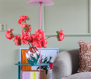 Chrome in het interieur: de trend die onze kunstbloemen laat stralen!