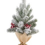 Kleine, met sneeuw bestrooide Kunstkerstboom mini Fjord van 37 cm, versierd met rode bessen en omhuld met een lichtbruine jutevoet.