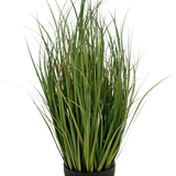 Het Kunstgras Dogtail uiengras Bran 90 cm brandvertragend is een zwarte pot met dichte, hoge, dunne, groene, grasachtige bladeren die rechtop staan, afgebeeld tegen een witte achtergrond.