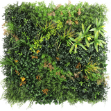 De Kunsthaag Marisa 100x100 cm UV is een weelderige, vierkante groene muur met gemengde bladplanten, varens, geelgroene accenten en verspreide bruinachtige bladeren tegen een effen witte achtergrond.