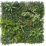 De Kunsthaag Prestige 100x100 cm UV is een vierkant paneel van kunstgroen gebladerte met gemengde bladplanten, varens, gevarieerde texturen en tinten groen, plus clusters van kleine witte en rode bloemen. De achtergrond is wit.