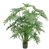 Een Kunstplant Philodendron 125 cm met grote, groene, diep gespleten bladeren tegen een witte achtergrond.